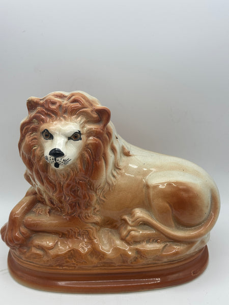 Pair of Staffordshire Pottery Lions. Late 19th century. 11" Length