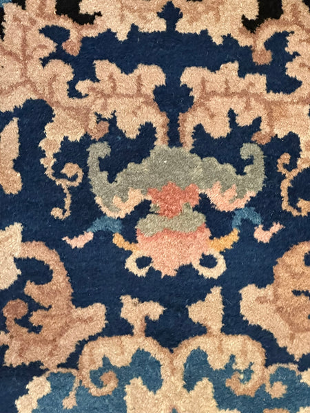 Chinese Oval Rug. Black Ground. Circa 1920s. 7' 9.5" x 4' 1.5". (LTD)