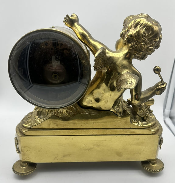 French Mantle Clock Guibel Paris 19th Century. Gilded Bronze Cherub Playing Drum