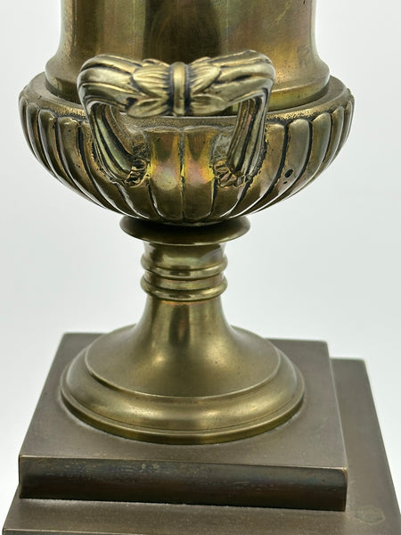Pair Urns on Pedestal. Brass with Classical Scenes. 12" Height