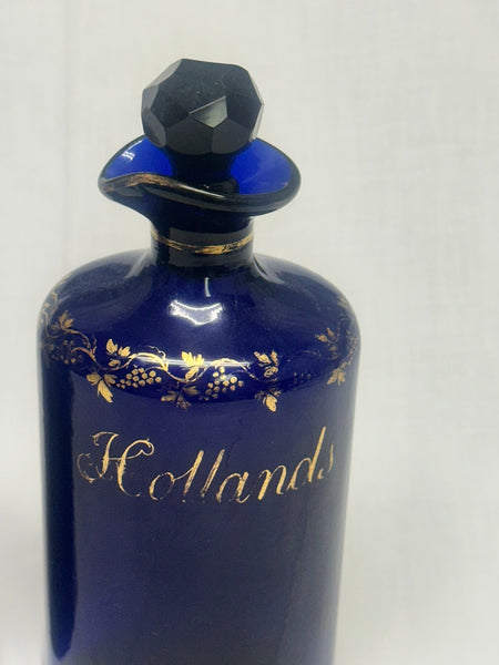 Three Liquor Decanters. Bristol Blue and Gold Glass. 18th Century