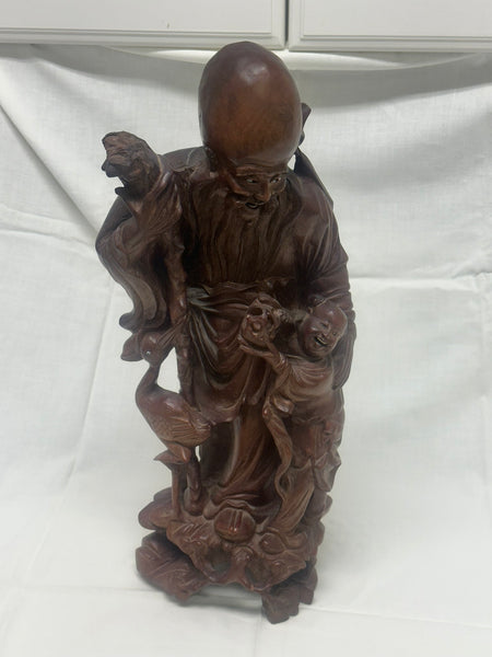 Chinese Carved Wood Immortal with Crane and Boy. Qing. 16 1/2" height