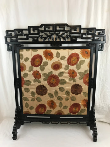 Chinoiserie fire screen. Ebonized wood. Late 19th Century